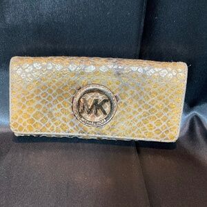 Michael Kors yellow tones of snake skin patterned wallet.   8-H7B